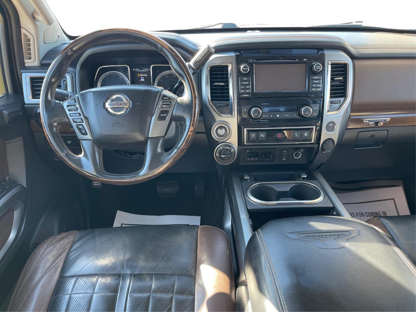 2017 Nissan Titan Platinum Reserve Crew Cab 4WD (1N6AA1E53HN) with an 5.6L V8 DOHC 32V engine, 6-Speed Automatic transmission, located at 1184 Kauffman Ave, Fairborn, OH, 45324, (937) 908-9800, 39.807072, -84.030914 - 2017 Nissan Titan Platinum Reserve Crew Cab 4WD - Photo#20