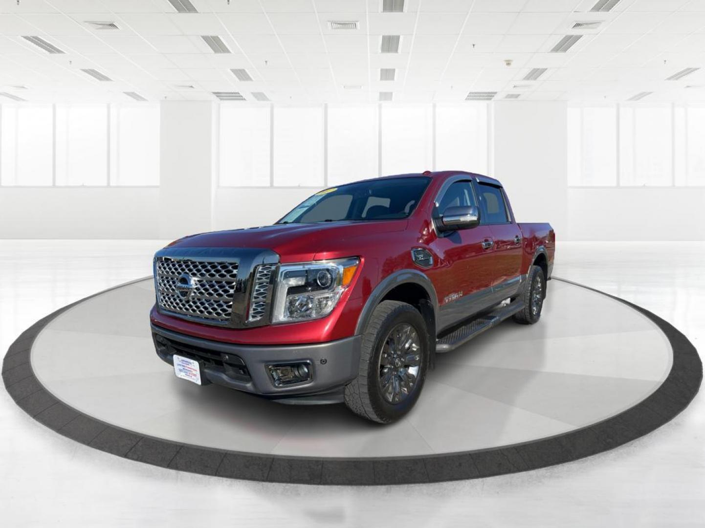 2017 Nissan Titan Platinum Reserve Crew Cab 4WD (1N6AA1E53HN) with an 5.6L V8 DOHC 32V engine, 6-Speed Automatic transmission, located at 1230 East Main St, Xenia, OH, 45385, (937) 908-9800, 39.688026, -83.910172 - Photo#7