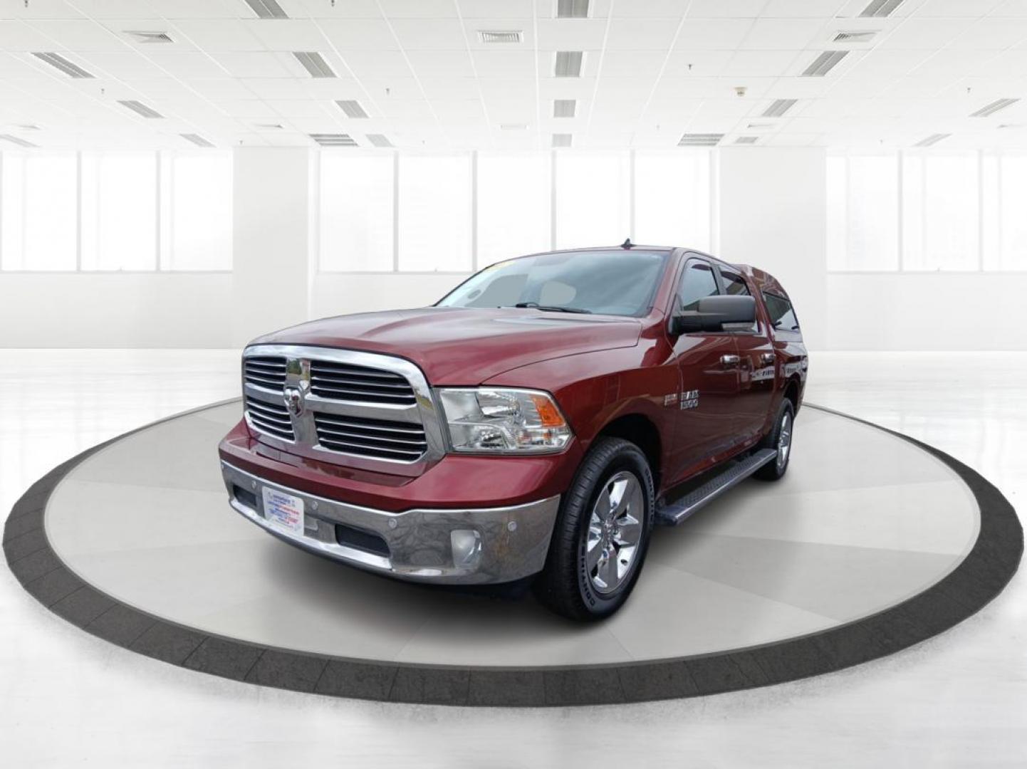 2017 Delmonico Red Pearl Coat RAM 1500 SLT Crew Cab SWB 4WD (3C6RR7LT1HG) with an 5.7L V8 OHV 16V engine, 8A transmission, located at 880 E. National Road, Vandalia, OH, 45377, (937) 908-9800, 39.891918, -84.183594 - Photo#7