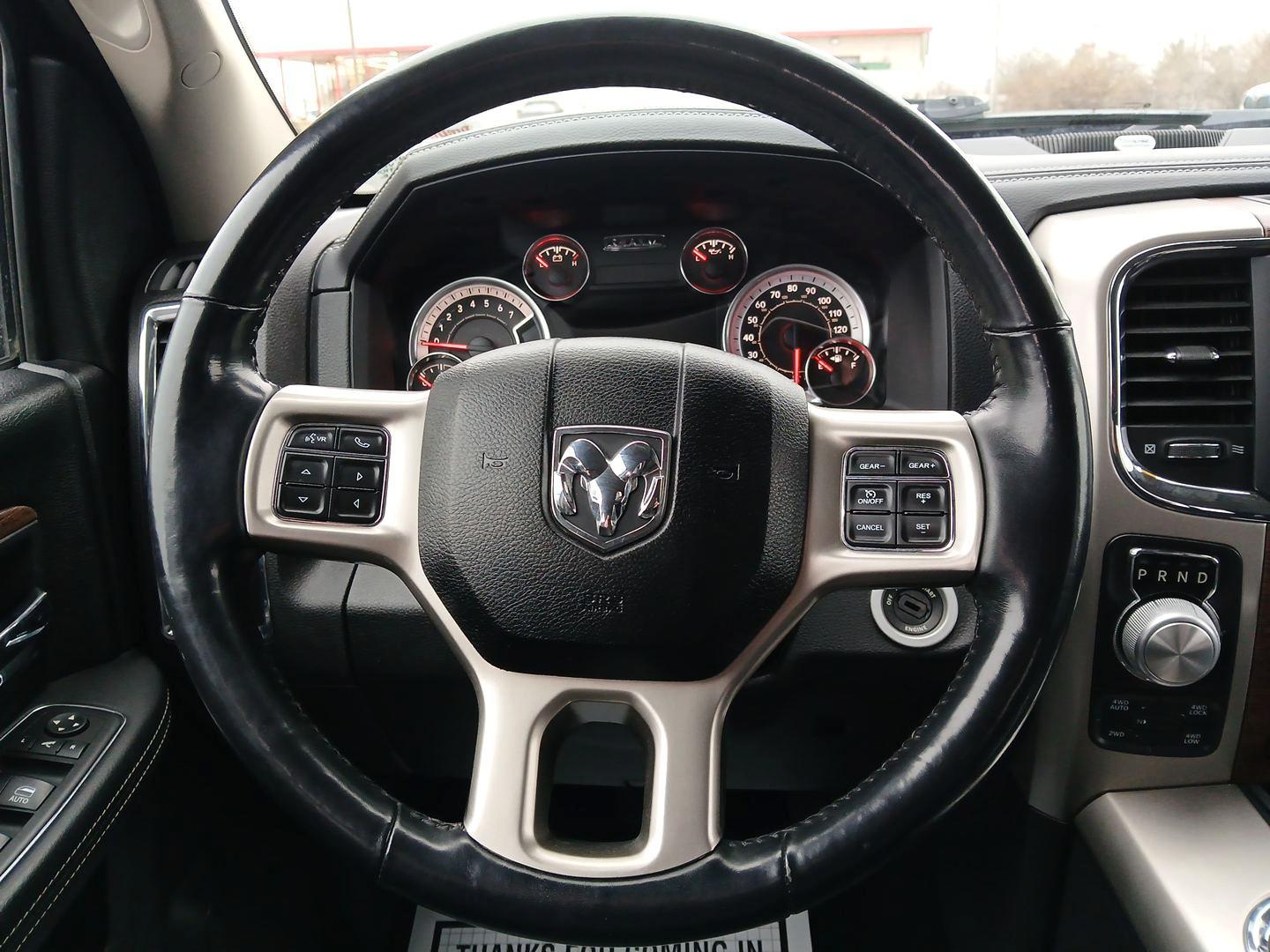 2017 RAM 1500 Laramie Quad Cab 4WD (1C6RR7JT1HS) with an 5.7L V8 OHV 16V engine, 8-Speed Automatic transmission, located at 1099 N County Rd 25A , Troy, OH, 45373, (937) 908-9800, 40.057079, -84.212883 - 2017 RAM 1500 Laramie Quad Cab 4WD - Photo#14