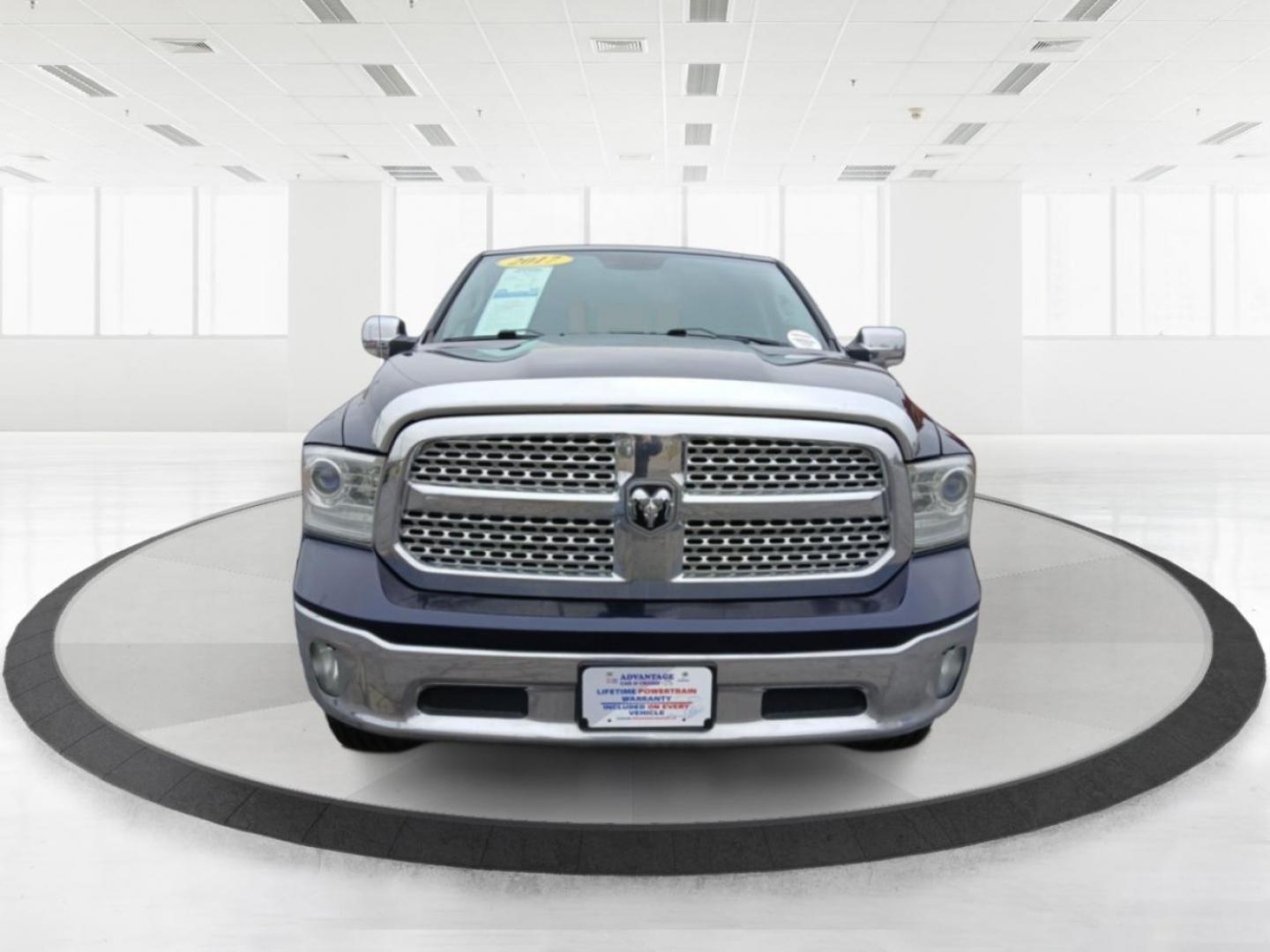 2017 RAM 1500 Laramie Quad Cab 4WD (1C6RR7JT1HS) with an 5.7L V8 OHV 16V engine, 8-Speed Automatic transmission, located at 1099 N County Rd 25A , Troy, OH, 45373, (937) 908-9800, 40.057079, -84.212883 - 2017 RAM 1500 Laramie Quad Cab 4WD - Photo#6