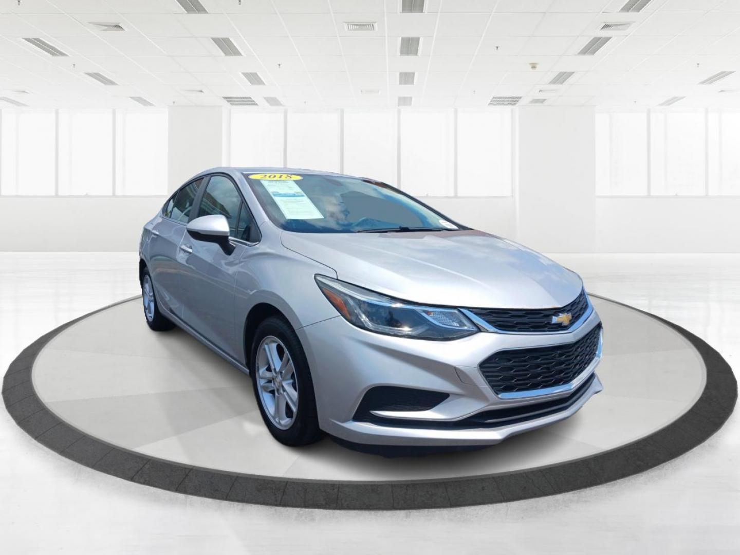 2018 Silver Ice Metallic Chevrolet Cruze LT Auto (1G1BE5SMXJ7) with an 1.4L L4 DOHC 16V TURBO engine, 6A transmission, located at 1184 Kauffman Ave, Fairborn, OH, 45324, (937) 908-9800, 39.807072, -84.030914 - Photo#0