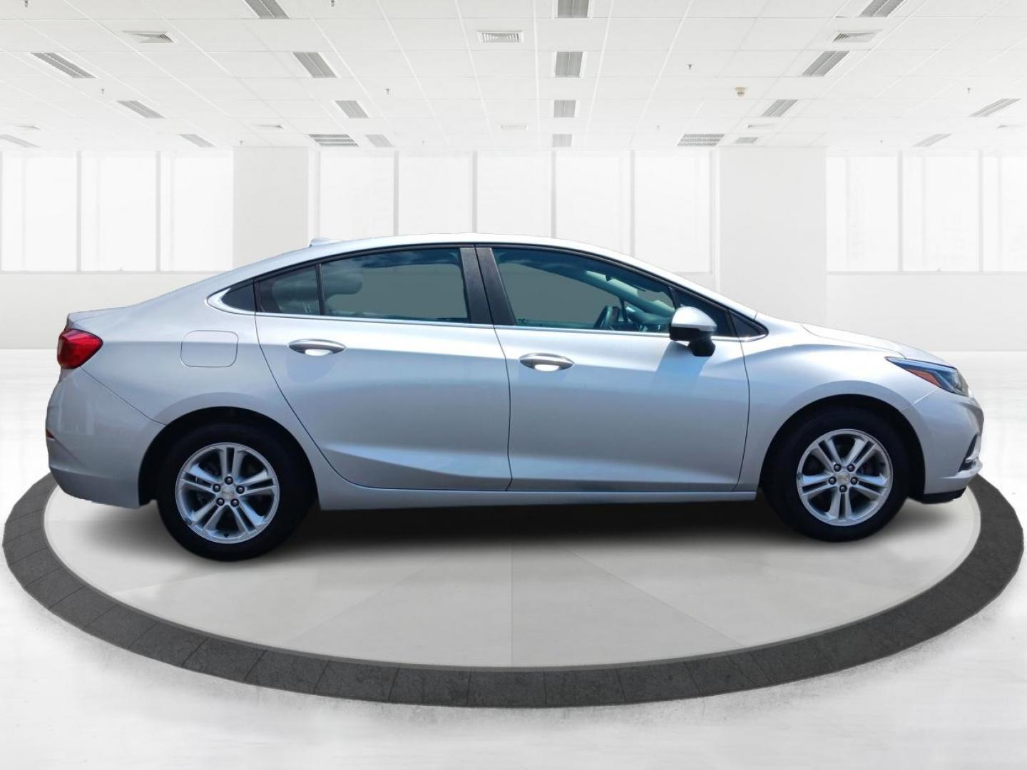 2018 Silver Ice Metallic Chevrolet Cruze (1G1BE5SMXJ7) with an 1.4L L4 DOHC 16V TURBO engine, 6-Speed Automatic transmission, located at 1099 N County Rd 25A , Troy, OH, 45373, (937) 908-9800, 40.057079, -84.212883 - Photo#1