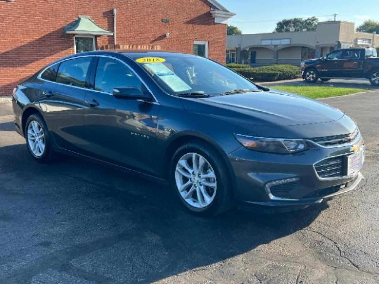 2018 Nightfall Gray Metallic Chevrolet Malibu LT (1G1ZD5ST9JF) with an 1.5L L4 DOHC 16V engine, 6-Speed Automatic transmission, located at 1230 East Main St, Xenia, OH, 45385, (937) 908-9800, 39.688026, -83.910172 - Photo#0