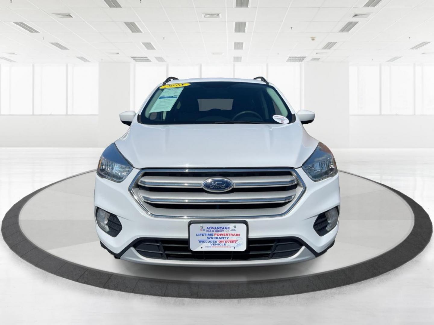 2018 Oxford White Ford Escape SE FWD (1FMCU0GD6JU) with an 1.5L L4 DOHC 16V engine, 6A transmission, located at 880 E. National Road, Vandalia, OH, 45377, (937) 908-9800, 39.891918, -84.183594 - Photo#6