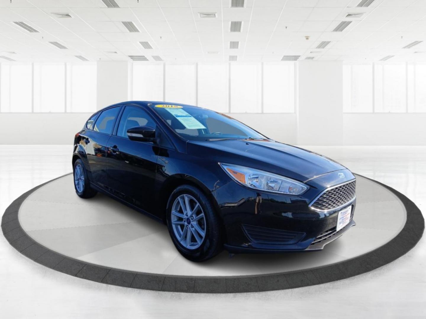 2018 Shadow Black Ford Focus SE Hatch (1FADP3K20JL) with an 2.0L L4 DOHC 16V engine, located at 1951 S Dayton Lakeview Rd., New Carlisle, OH, 45344, (937) 908-9800, 39.890999, -84.050255 - Photo#0