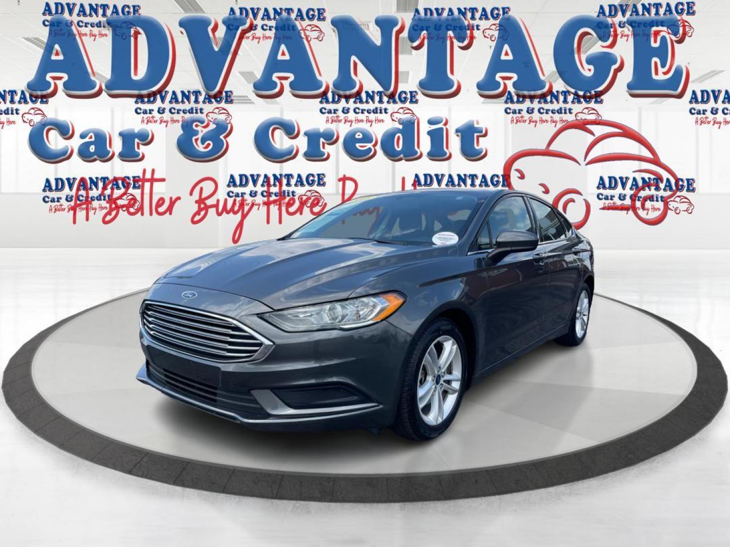 2018 Magnetic Metallic Ford Fusion SE (3FA6P0HD2JR) with an 1.5L L4 DOHC 16V engine, 6A transmission, located at 1184 Kauffman Ave, Fairborn, OH, 45324, (937) 908-9800, 39.807072, -84.030914 - Photo#7