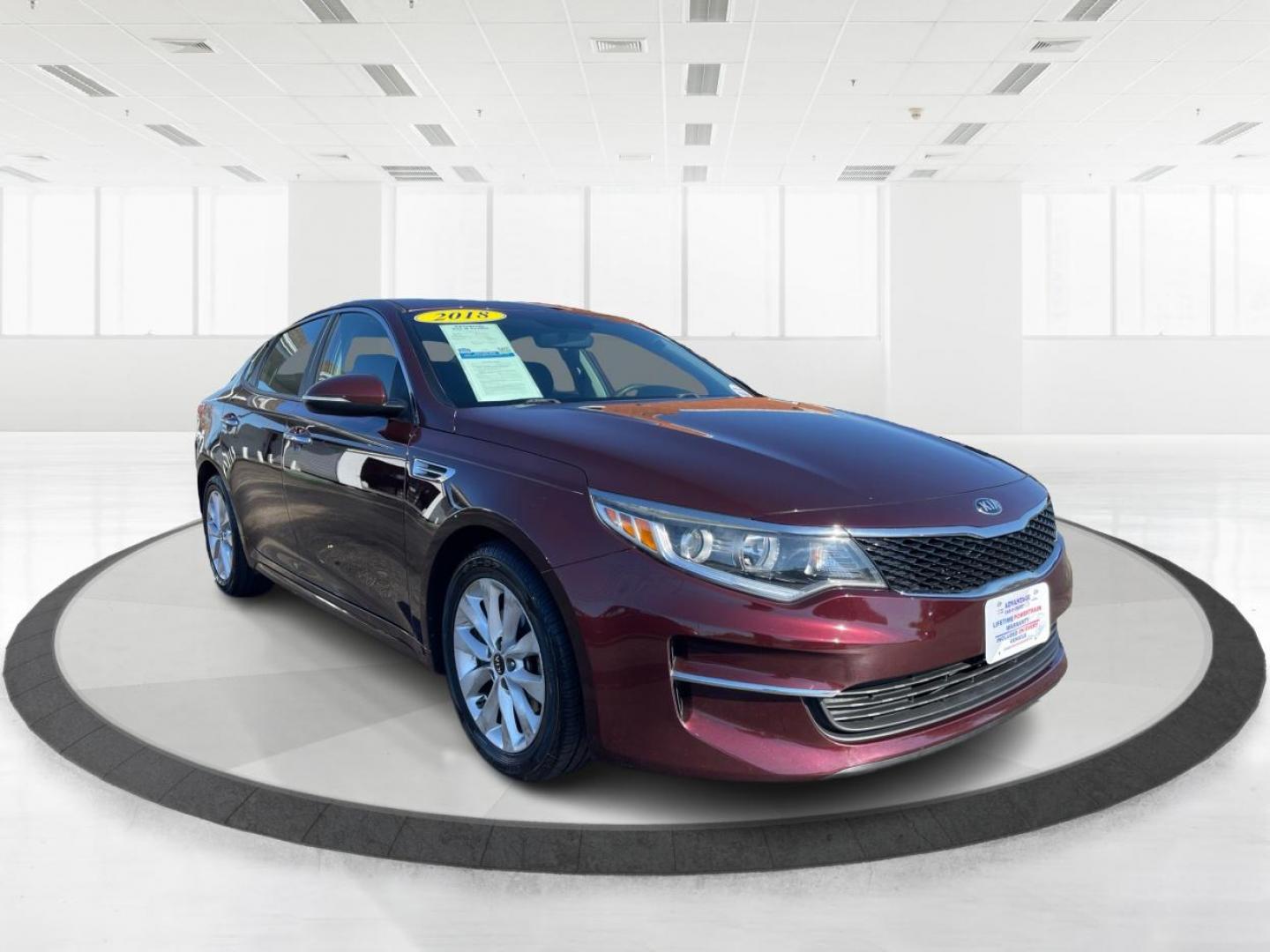 2018 Sangria Kia Optima LX (5XXGT4L34JG) with an 2.4L L4 DOHC 16V engine, 6A transmission, located at 401 Woodman Dr, Riverside, OH, 45431, (937) 908-9800, 39.760899, -84.123421 - Photo#0