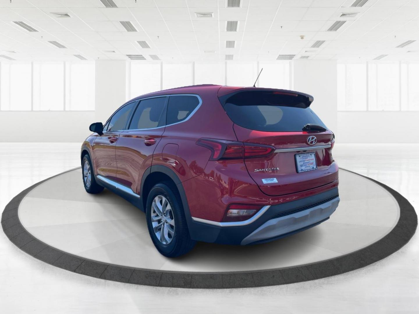 2019 Scarlet Red Hyundai Santa Fe SE 2.4 AWD (5NMS2CAD9KH) with an 2.4L L4 DOHC 16V engine, 8A transmission, located at 880 E. National Road, Vandalia, OH, 45377, (937) 908-9800, 39.891918, -84.183594 - Photo#4